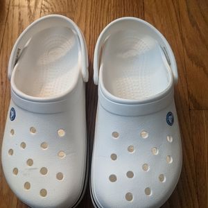 White women's Croc band Crocs